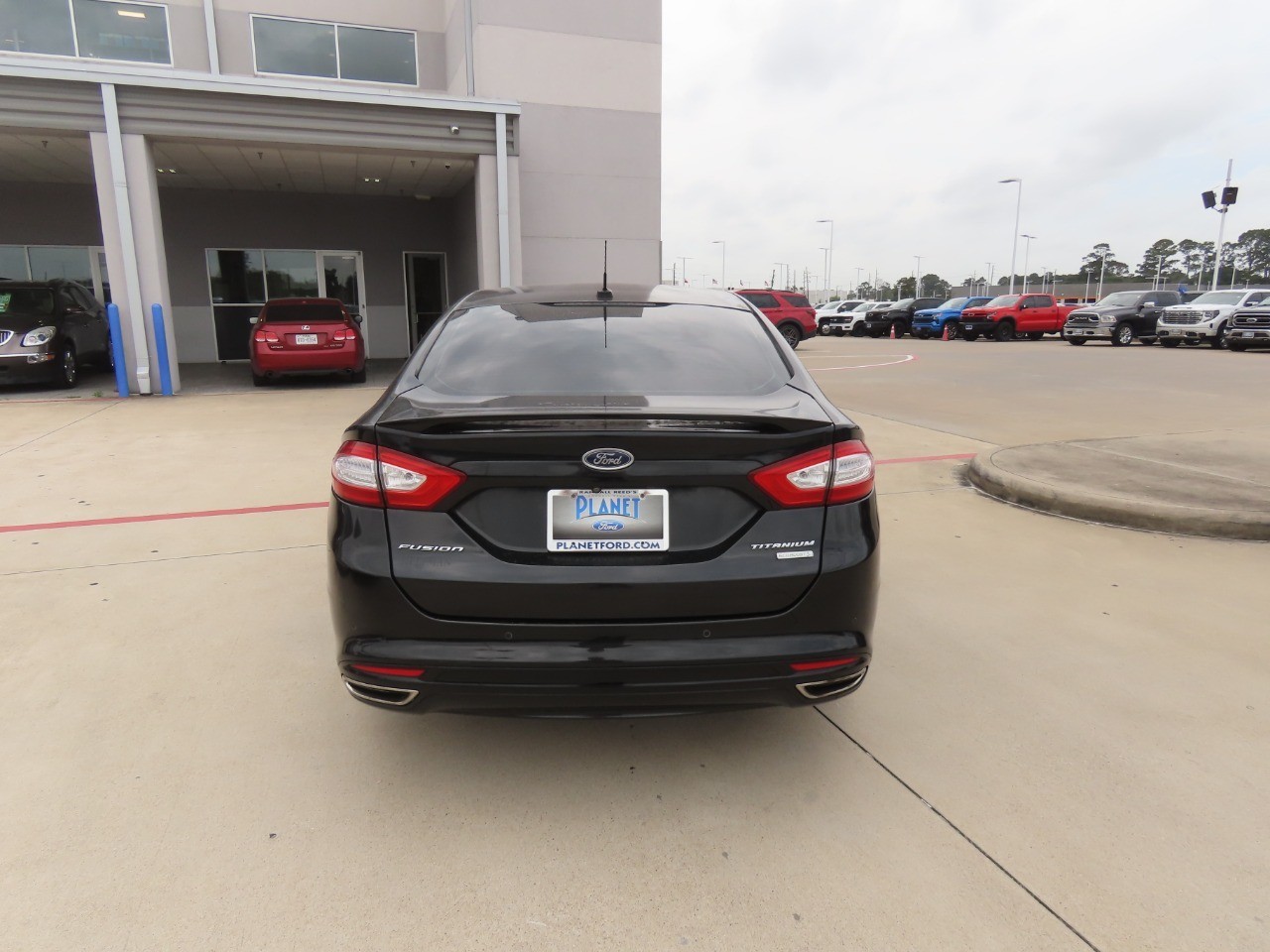 used 2014 Ford Fusion car, priced at $11,999