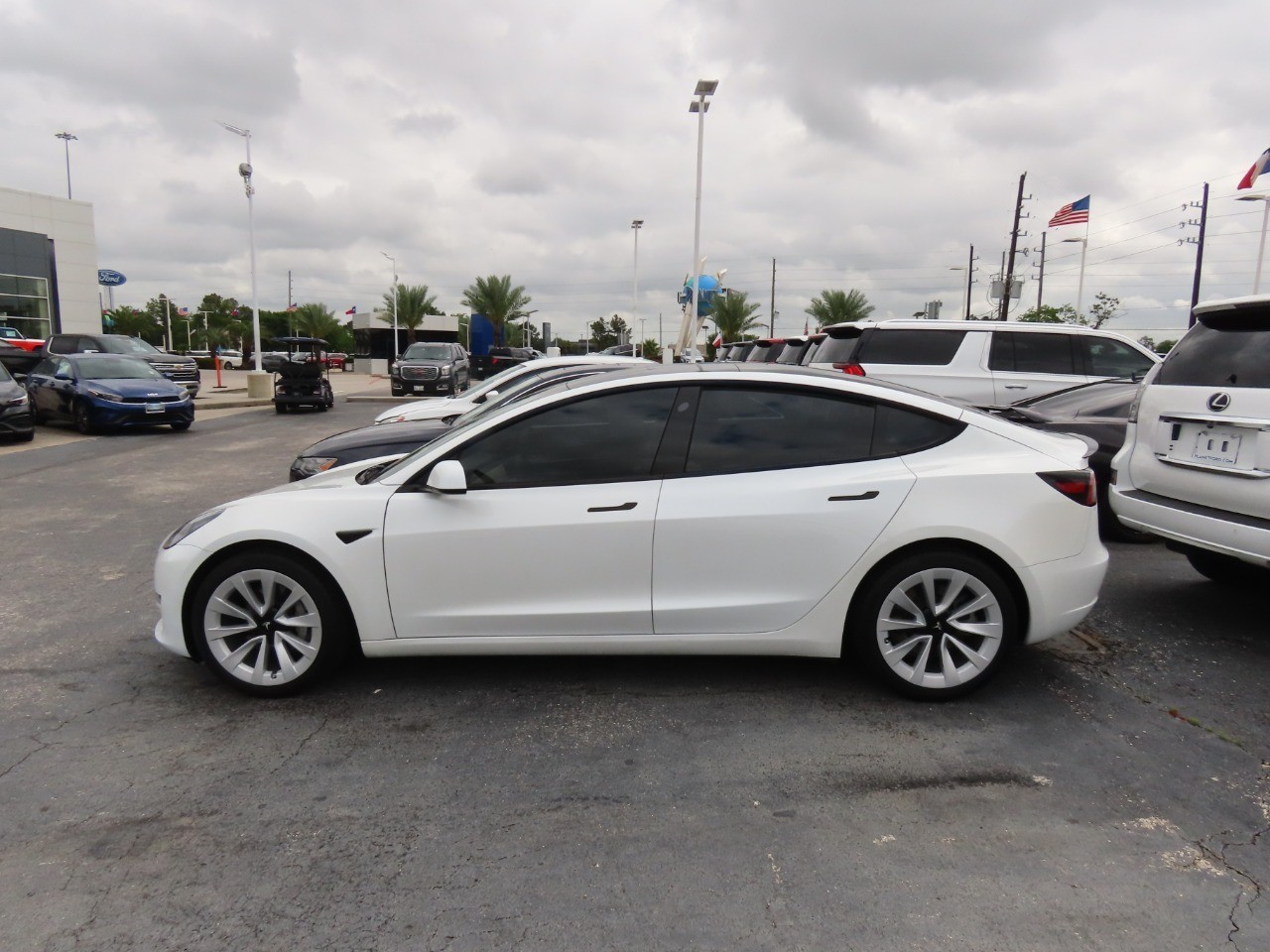 used 2023 Tesla Model 3 car, priced at $26,999