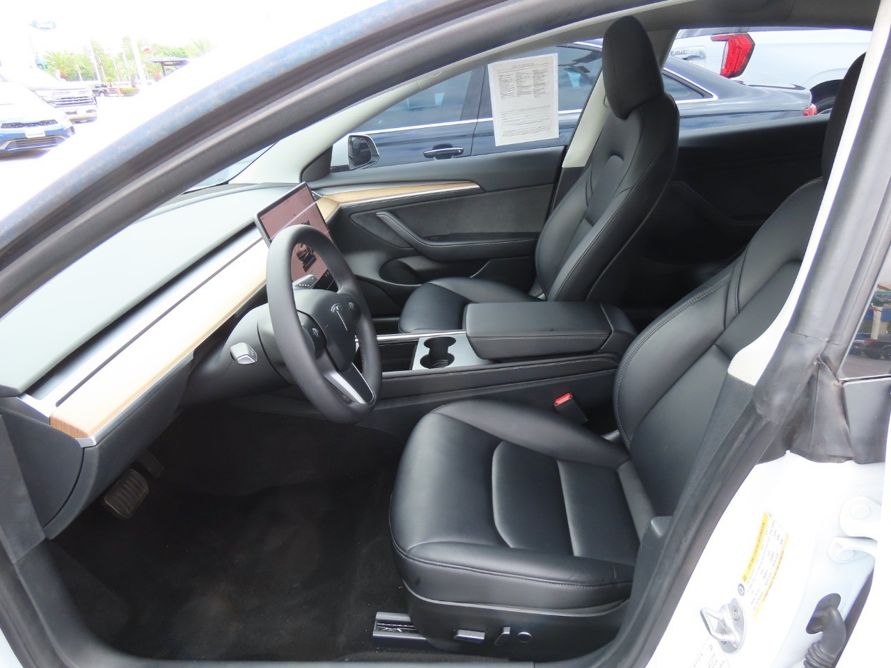 used 2023 Tesla Model 3 car, priced at $26,999