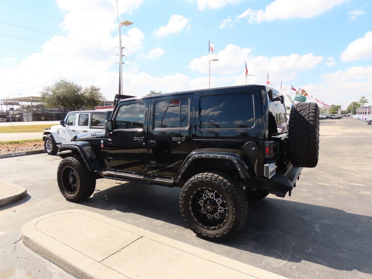 used 2015 Jeep Wrangler Unlimited car, priced at $21,999