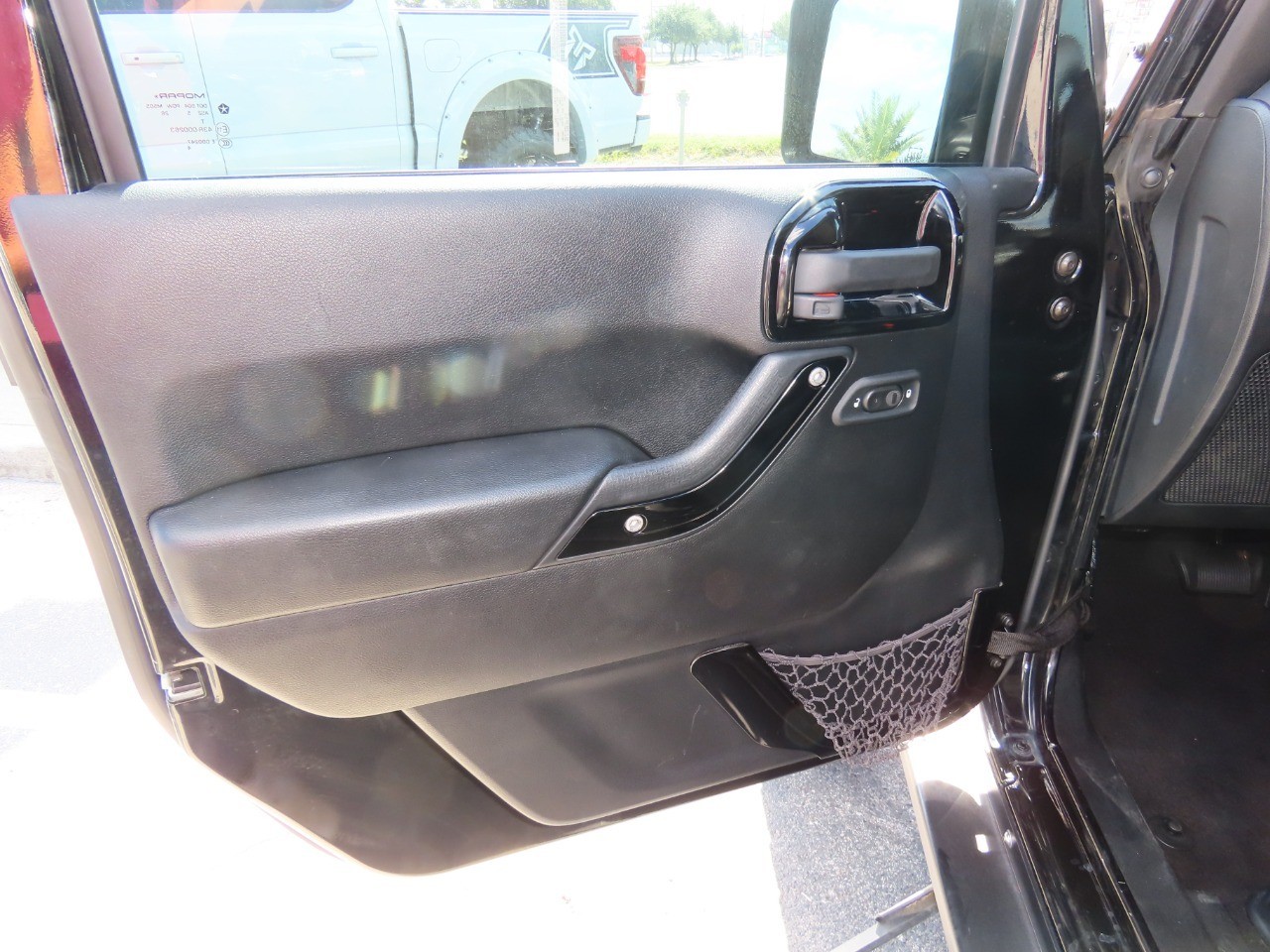 used 2015 Jeep Wrangler Unlimited car, priced at $21,999