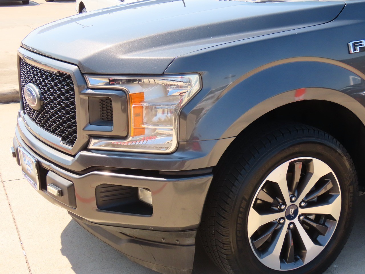used 2019 Ford F-150 car, priced at $14,999