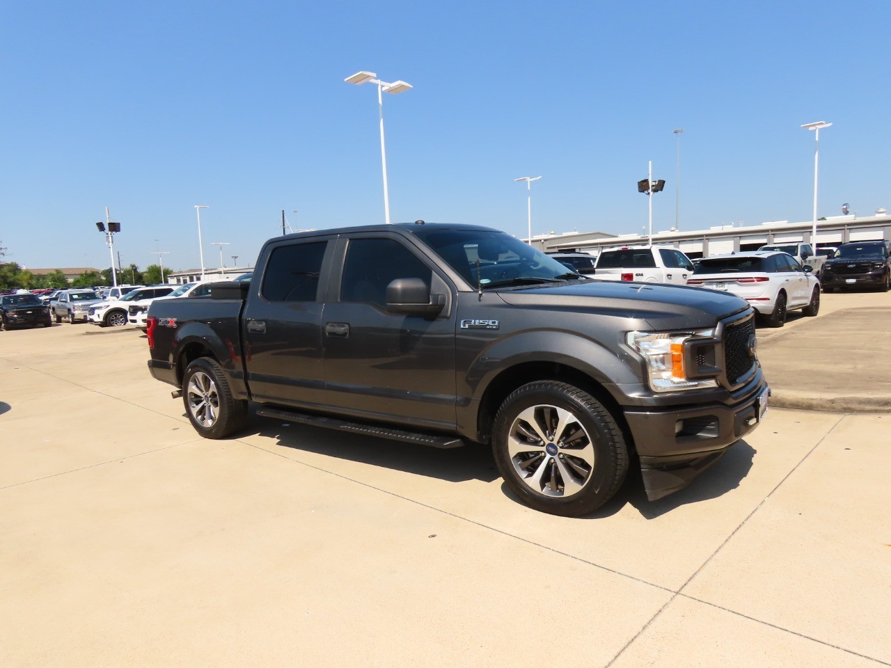 used 2019 Ford F-150 car, priced at $14,999