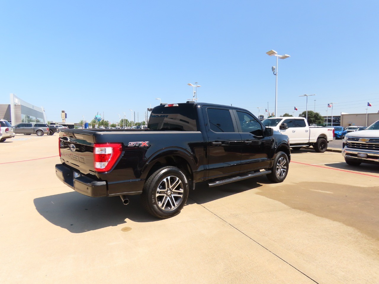 used 2023 Ford F-150 car, priced at $34,999