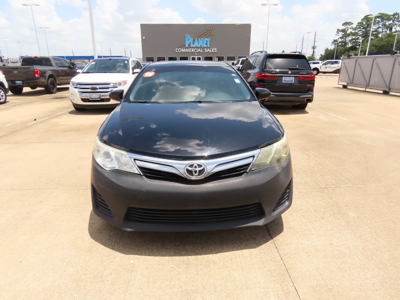 used 2014 Toyota Camry car, priced at $9,999