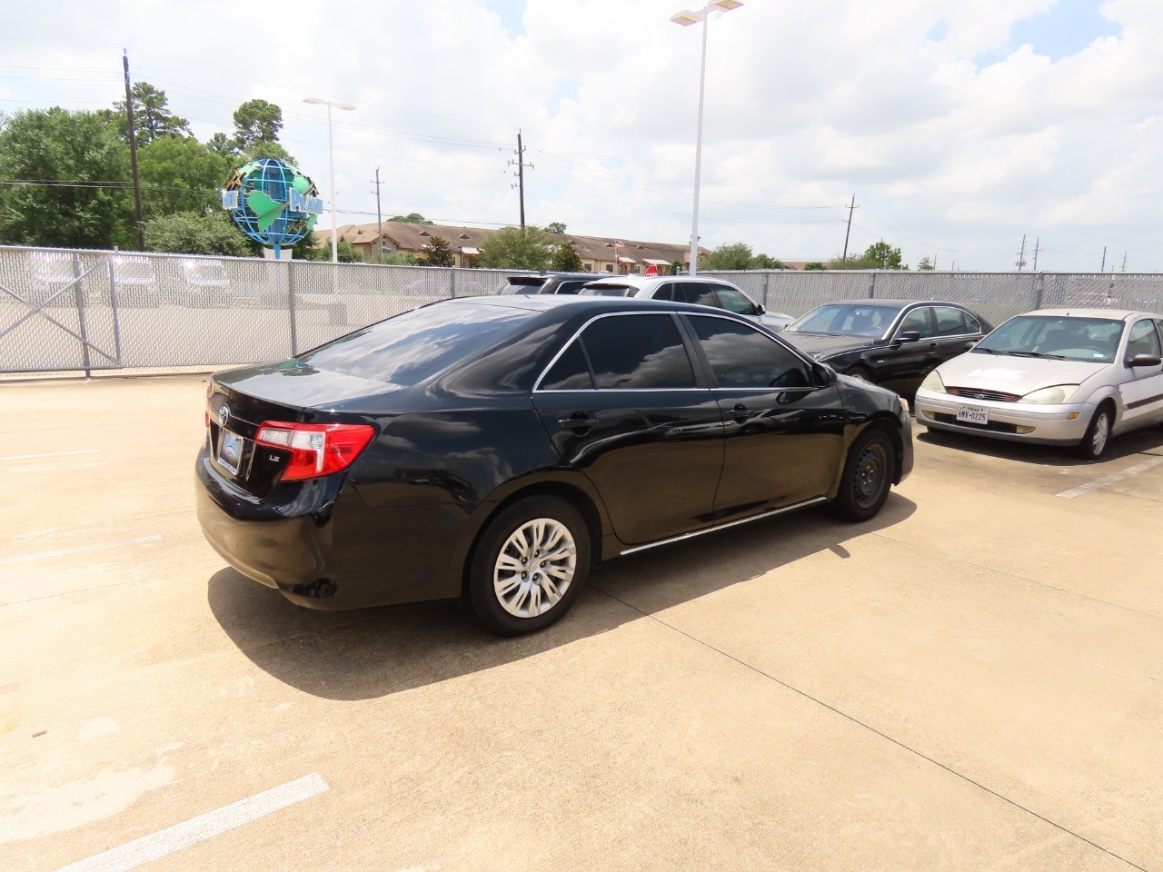 used 2014 Toyota Camry car, priced at $9,999